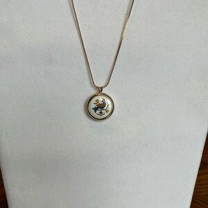 Avon Bird of Happiness pendant necklace